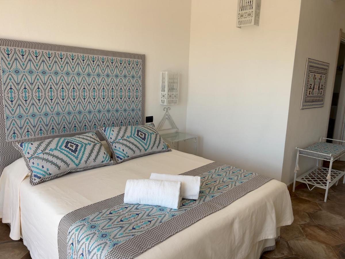 Hotel Altura Villasimius Bagian luar foto